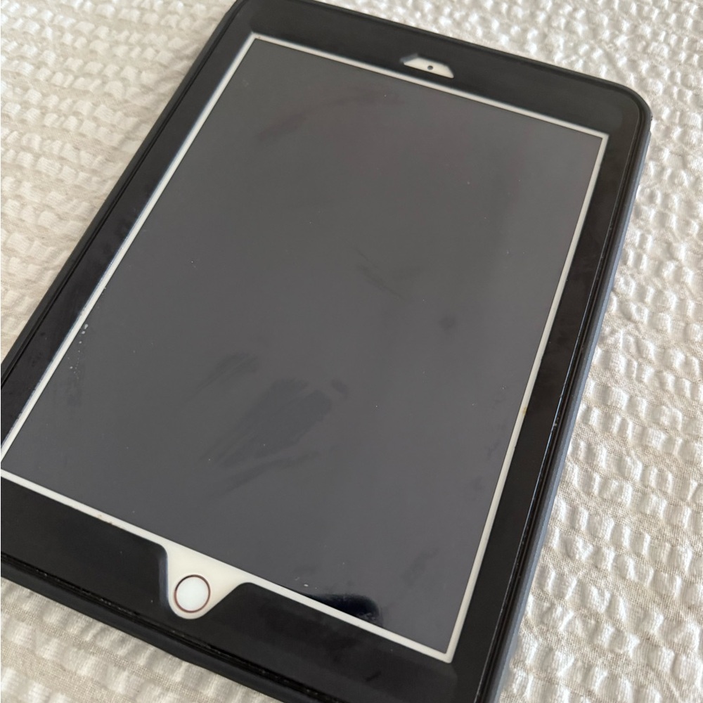 Apple Black Tablet with White Trim